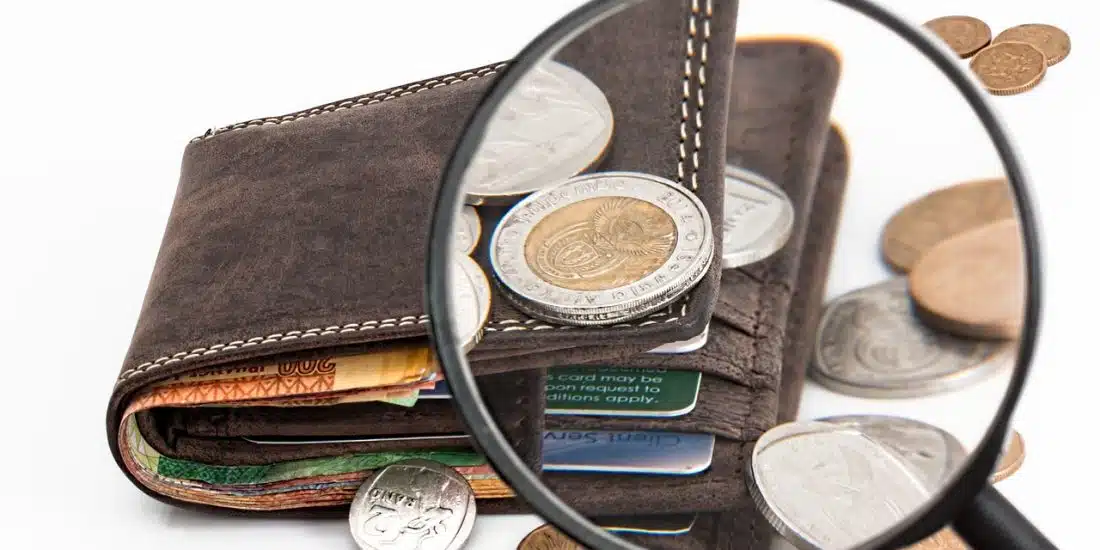 wallet, coins, magnifying glass