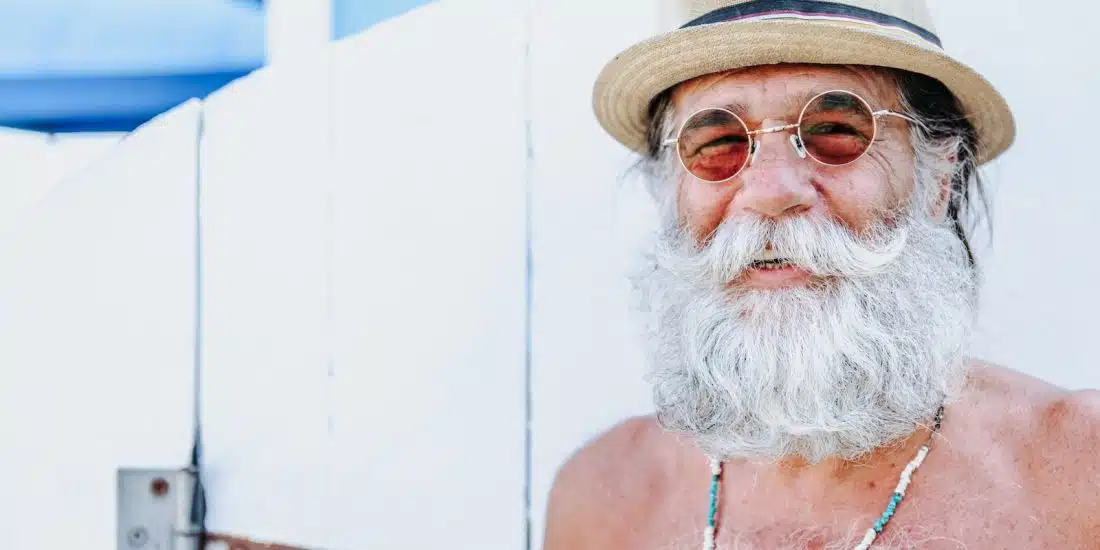 a man with a white beard and hat